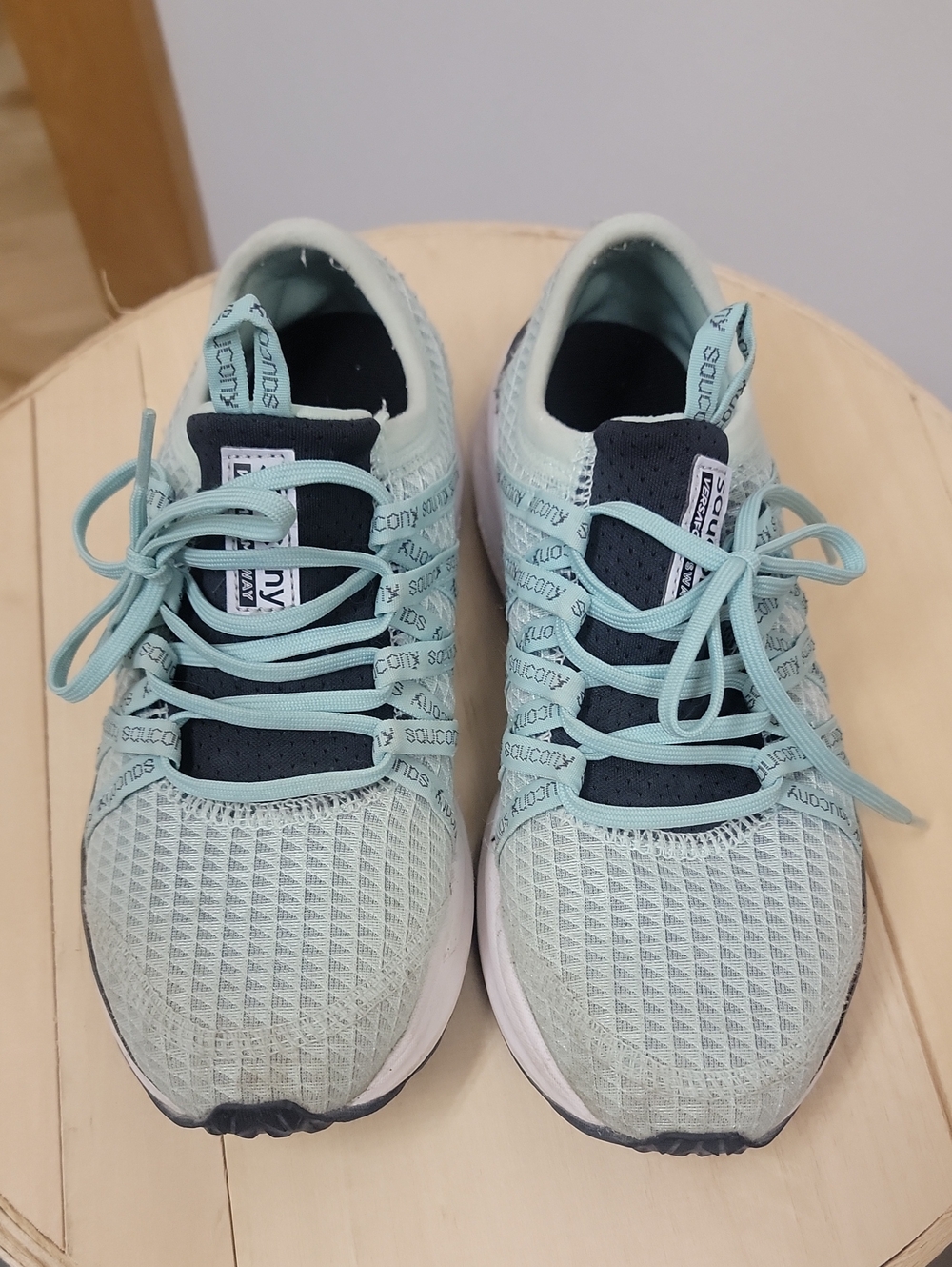 Saucony Light Mint and Navy Athletic Sneakers